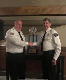 Chief Todd Lenderman congratulates the Randy Jones Memorial Award recipient, “Gibby” Jenkins.
PHOTO CREDIT: Donna Swicegood